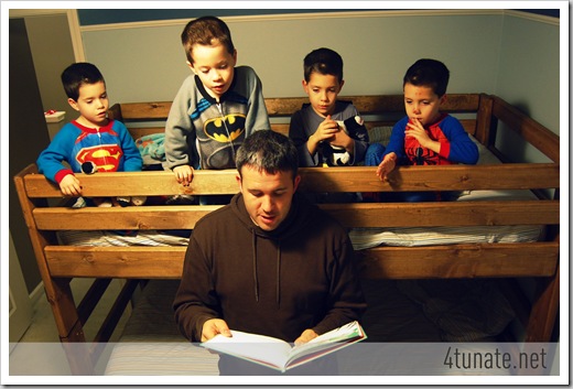 reading a bedtime story with daddy in bunk bed