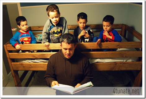 reading a bedtime story with daddy in bunk bed